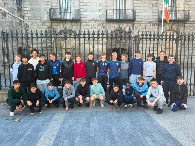 A very large group of De La Salle students photographed at the college gates